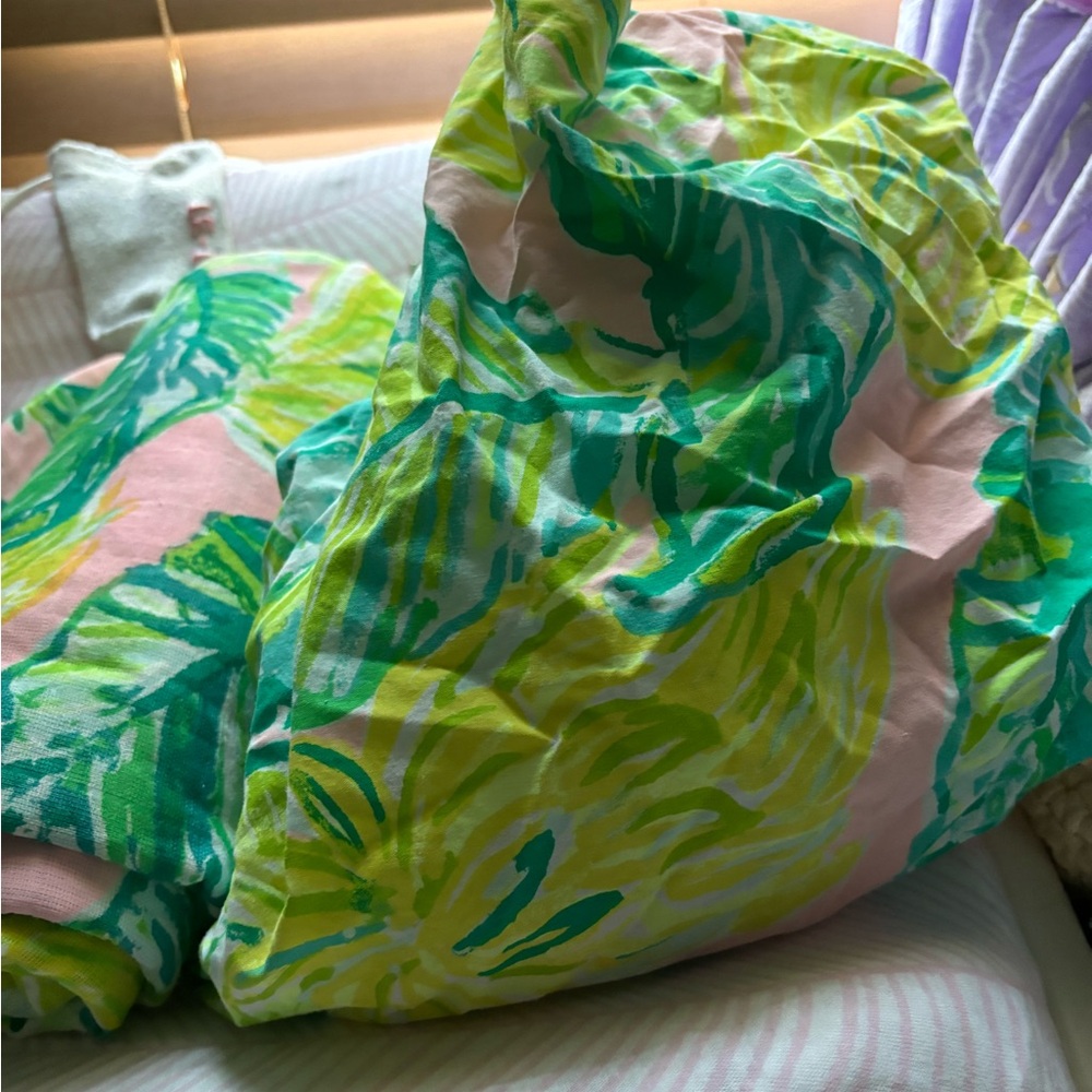 Lilly Pulitzer crib sheet with matching swaddle